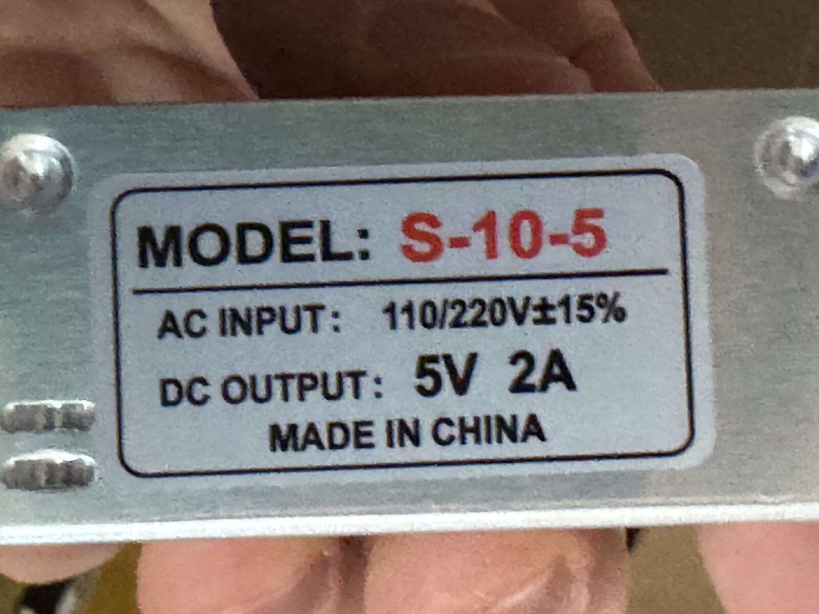 Rating label on the end of the AC to 5V 2A power supply, model S-10-5, 110 to 220V AC input and 5V 2A DC output