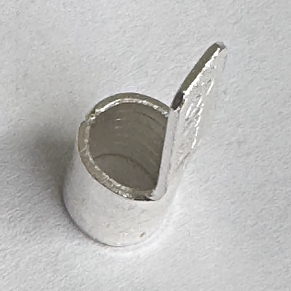 Looking into the barrel of the 16 mm2 ferrule connector, where the stripped cable goes