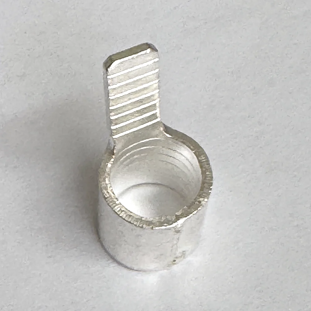 The 50 mm2 ferrule connector from above, showing the open barrel and the ridged inside face of the blade